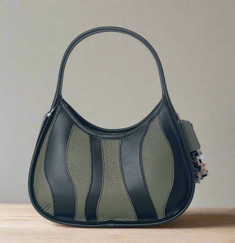 Handbag with black and beige pattern on a white background