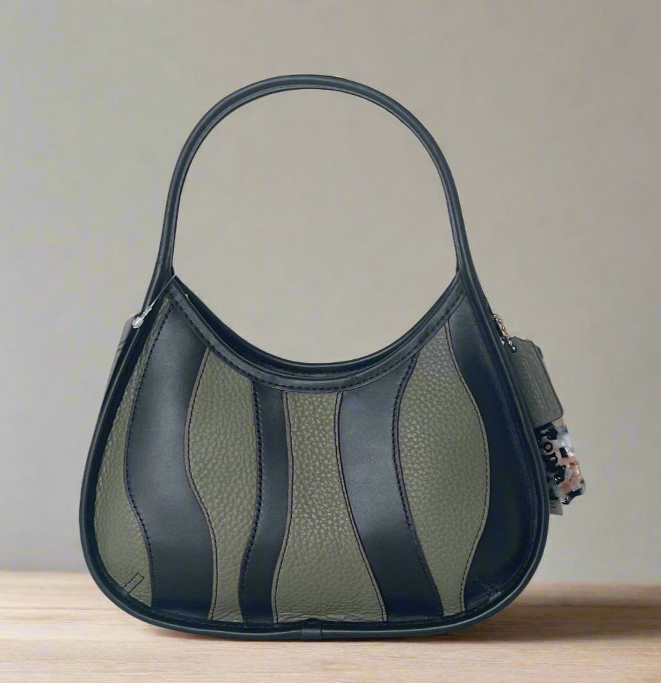 Handbag with black and beige pattern on a white background