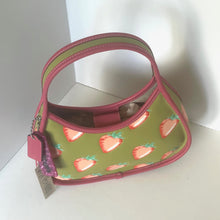 Load image into Gallery viewer, coach ergo Handbag with strawberry pattern on a white background