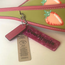 Load image into Gallery viewer, coach ergo Pink Coachtopia pouch with strawberry design on a white background