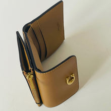 Load image into Gallery viewer, Brown leather wallet with gold zipper and clasp on a white background