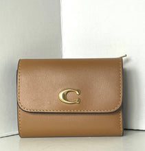 Load image into Gallery viewer, Brown wallet with a gold logo on a white background