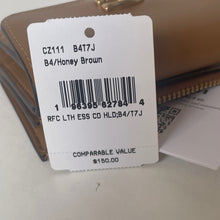 Load image into Gallery viewer, Product tag with barcode and text on a light background