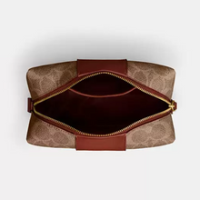 Load image into Gallery viewer, Brown leather pouch with gold zipper on a light gray background