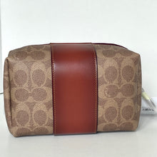 Load image into Gallery viewer, Coach handbag with brown leather stripe on a white background