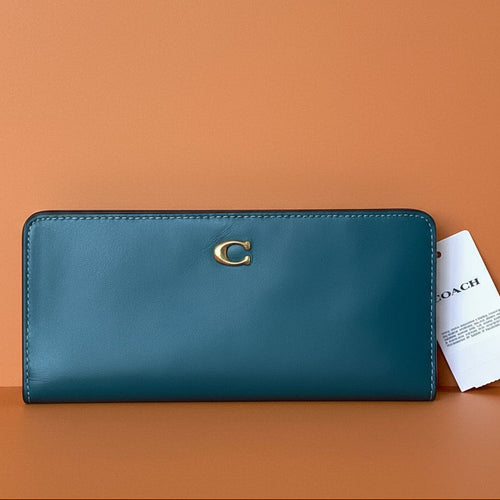 Blue wallet with a brand logo on a light gray background