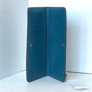 Blue wallet on a white surface with a white background