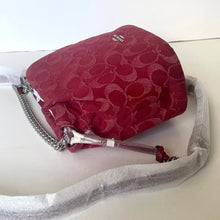 Load image into Gallery viewer, Red patterned handbag with a chain strap on a white surface