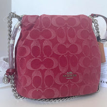 Load image into Gallery viewer, Red Coach handbag with silver chain strap on a white background