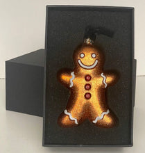 Load image into Gallery viewer, Gingerbread man ornament in a black box on a white surface