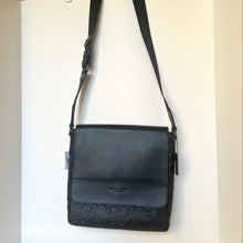 Load image into Gallery viewer, Black Coach shoulder bag on a white background