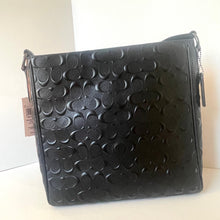 Load image into Gallery viewer, Black textured handbag on a white background