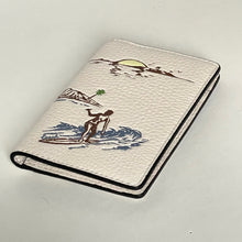 Load image into Gallery viewer, Notebook with beach-themed design on a light gray background