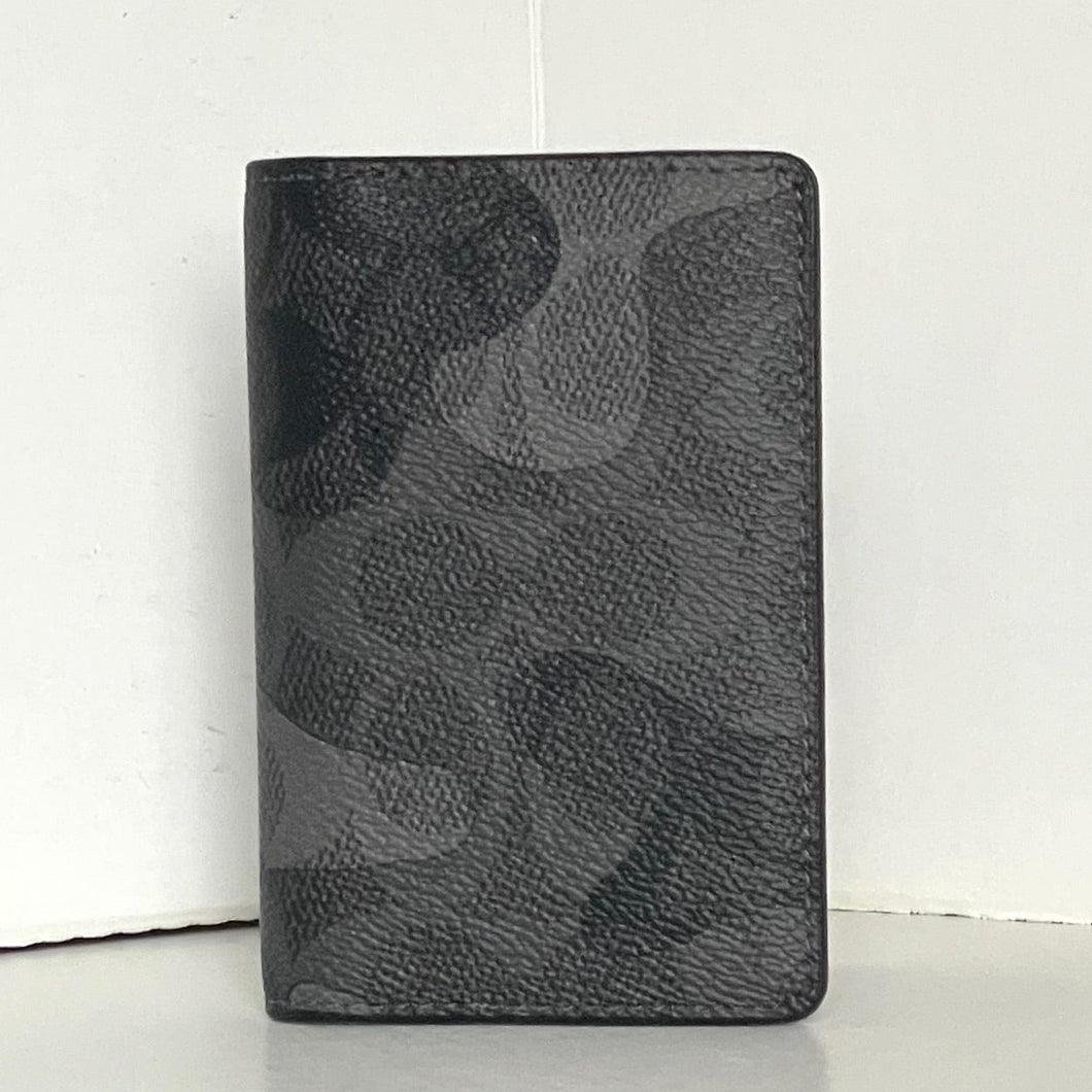 Black leather wallet with camouflage pattern on a white background