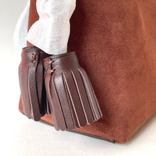 Load image into Gallery viewer, Brown leather bag with fringes on a white background