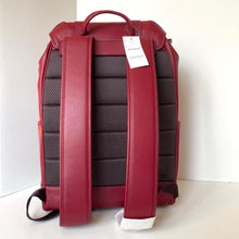 Load image into Gallery viewer, Red backpack with a visible brand tag on a white background