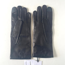 Load image into Gallery viewer, Pair of black leather gloves with a visible brand tag on a white background