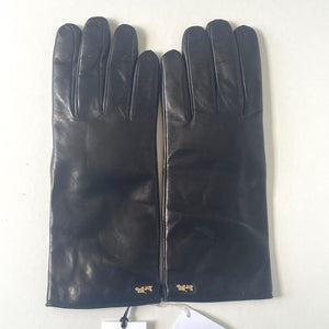 Pair of black leather gloves on a white background
