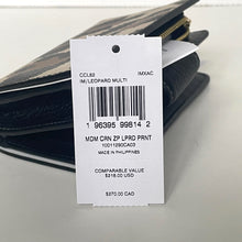 Load image into Gallery viewer, Leopard print wallet with a price tag on a light gray background