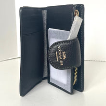 Load image into Gallery viewer, Black leather wallet with a card holder and key case on a white background