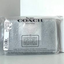 Load image into Gallery viewer, Coach New York pouch in clear packaging on a white background