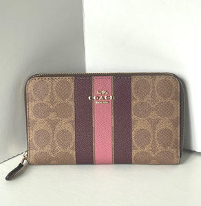 Coach wallet with multicolor pattern on a white background