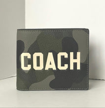 Load image into Gallery viewer, Camouflage-patterned wallet with 'COACH' branding on a white background