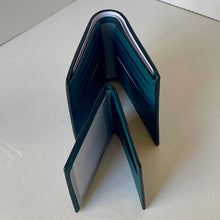 Load image into Gallery viewer, Green leather wallet on a white surface