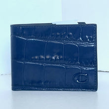 Load image into Gallery viewer, Blue crocodile-patterned wallet on a light blue background