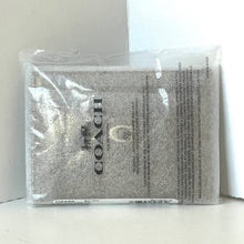 Load image into Gallery viewer, Coach product packaging on a white background