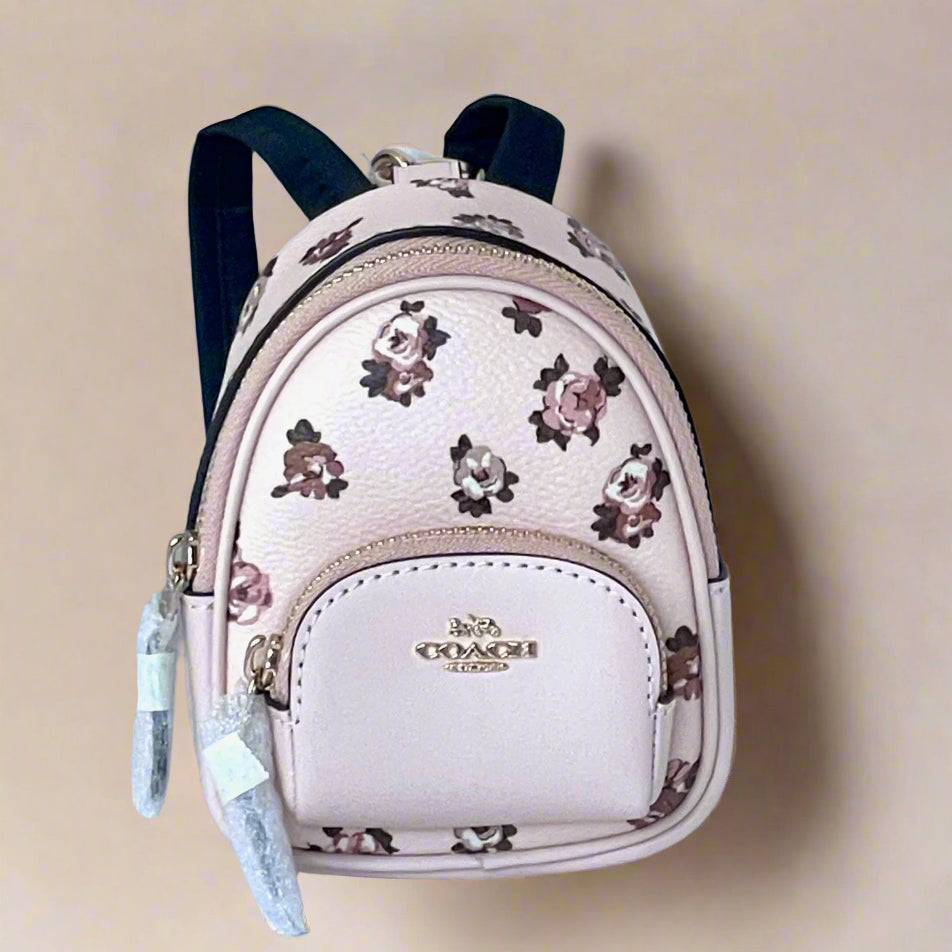 coach floral backpack Gold/Blush Multi Mini Court Backpack Bag Charm With Rosette Print