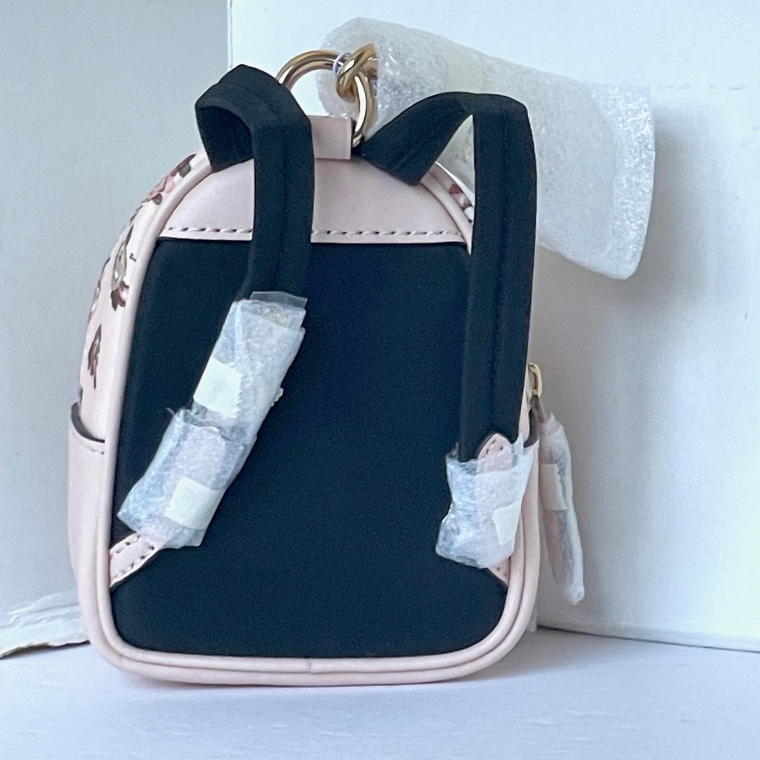 coach backpack with flower charm Gold/Blush Multi Mini Court Backpack Bag Charm With Rosette Print