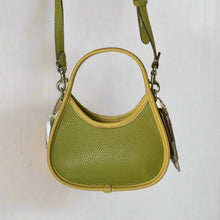 Load image into Gallery viewer, coach mini leather Green handbag with a strap on a white background