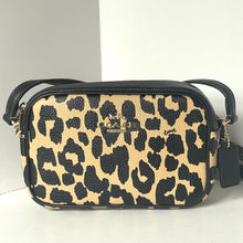 Load image into Gallery viewer, Leopard print handbag with black accents on a light background