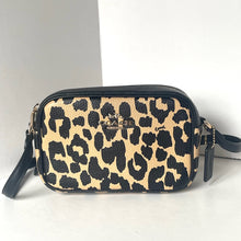 Load image into Gallery viewer, Leopard print handbag with black accents on a white background