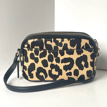 Load image into Gallery viewer, Leopard print handbag with navy accents on a white background