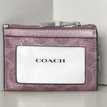 Load image into Gallery viewer, Coach wallet with a visible brand logo on a light background