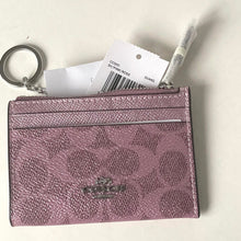 Load image into Gallery viewer, Pink wallet with a keychain and tag on a white background