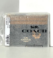 Load image into Gallery viewer, Coach wallet in packaging on a white background
