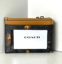 Load image into Gallery viewer, Coach cardholder with gold accents on a white background