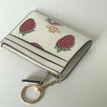 Load image into Gallery viewer, Cardholder with strawberry design and keychain on a white background