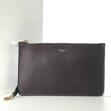 Load image into Gallery viewer, Dark brown Coach clutch bag on a white background