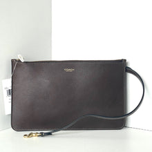Load image into Gallery viewer, Coach brown leather clutch with strap on a white background