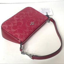 Load image into Gallery viewer, Red handbag with a visible brand logo on a white background