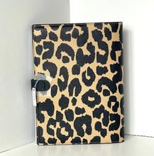 Load image into Gallery viewer, Leopard print notebook with a visible brand tag on a white background