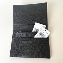 Load image into Gallery viewer, Black leather wallet with a tag on a white background
