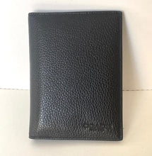 Load image into Gallery viewer, Black leather wallet on a light beige background