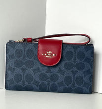 Load image into Gallery viewer, Coach wallet with red flap and blue pattern on a white background