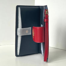 Load image into Gallery viewer, Black and red leather wallet with a pen holder on a white background