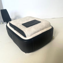 Load image into Gallery viewer, Black and beige travel case on a white surface